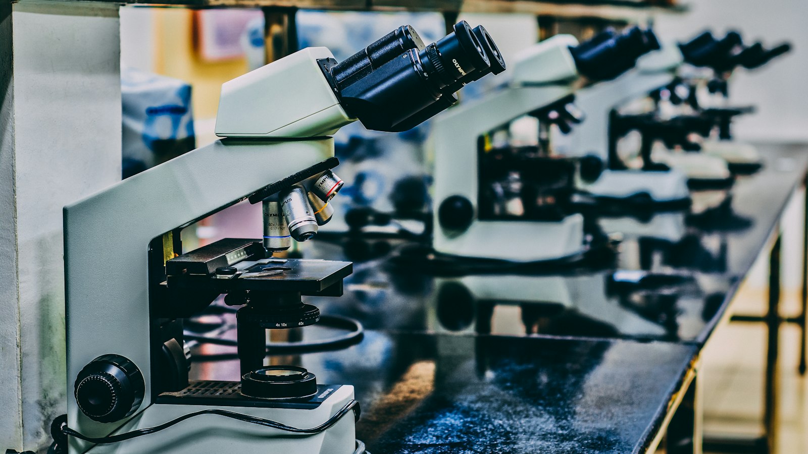 Supplement bottles on a lab bench, illustrating natural health product regulations in Canada