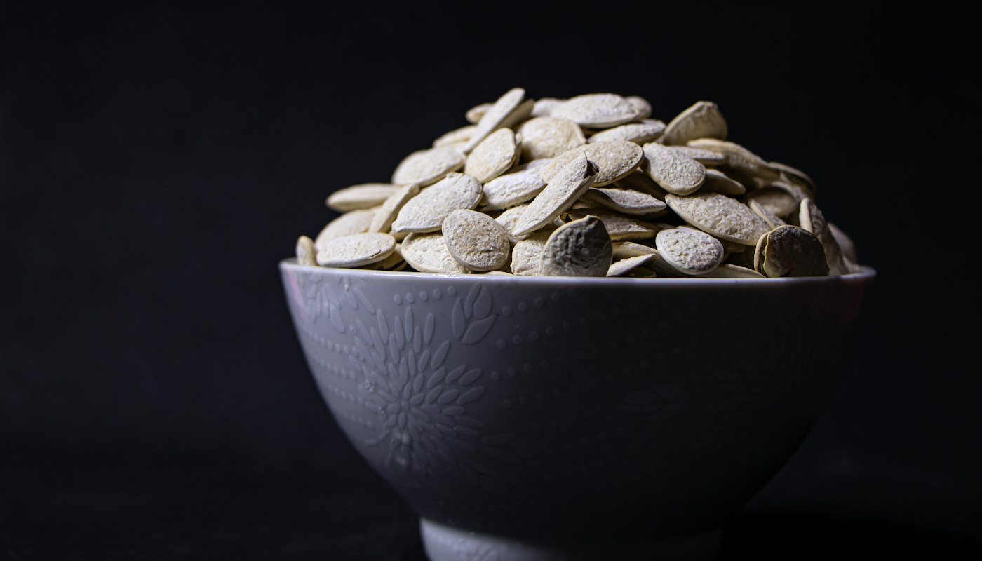 Magnesium-rich foods including almonds, pumpkin seeds and spinach
